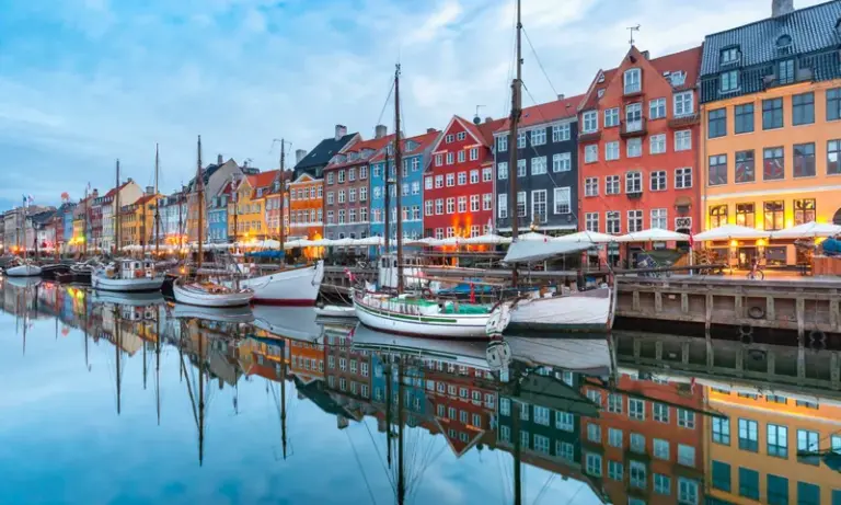 Colourful harbour houses and boats at Nyhavn, Copenhagen